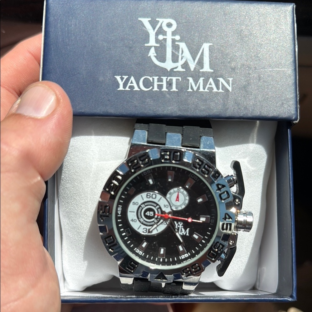 Black and Silver Chronograph Watch with Rotating Bezel